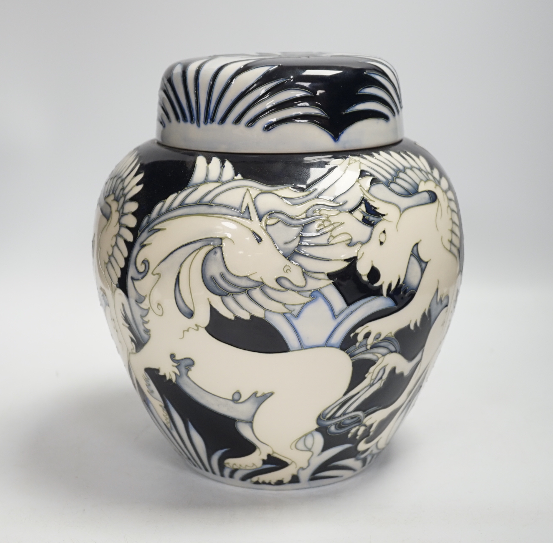 A large Moorcroft ‘Dance of the Griffin’ jar and cover, limited edition no 11/100. Designed by Vicky Lovatt. 24.5cm